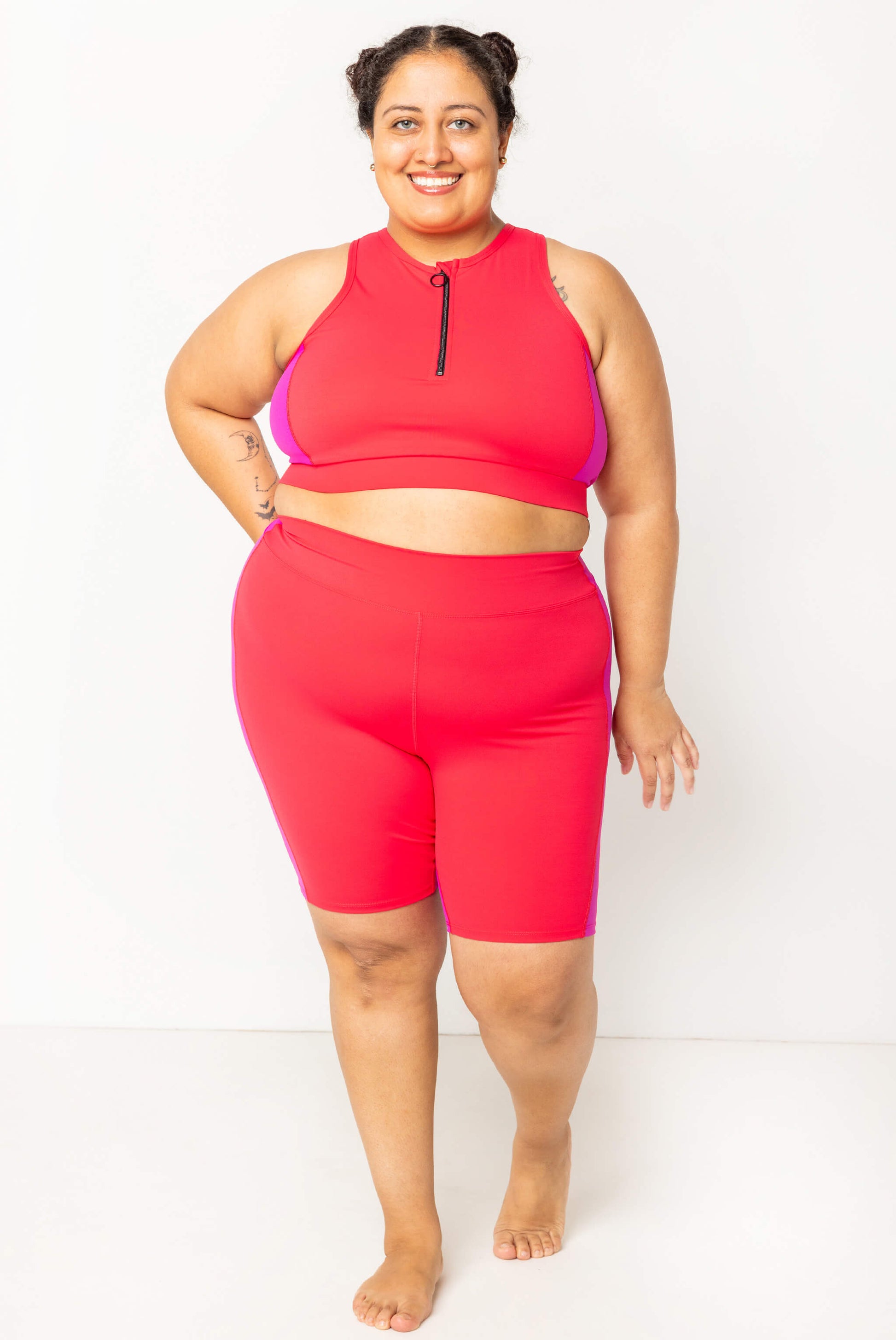 plus size model wearing 9 Inch Swim Shorts - Colorblock Fuchsia