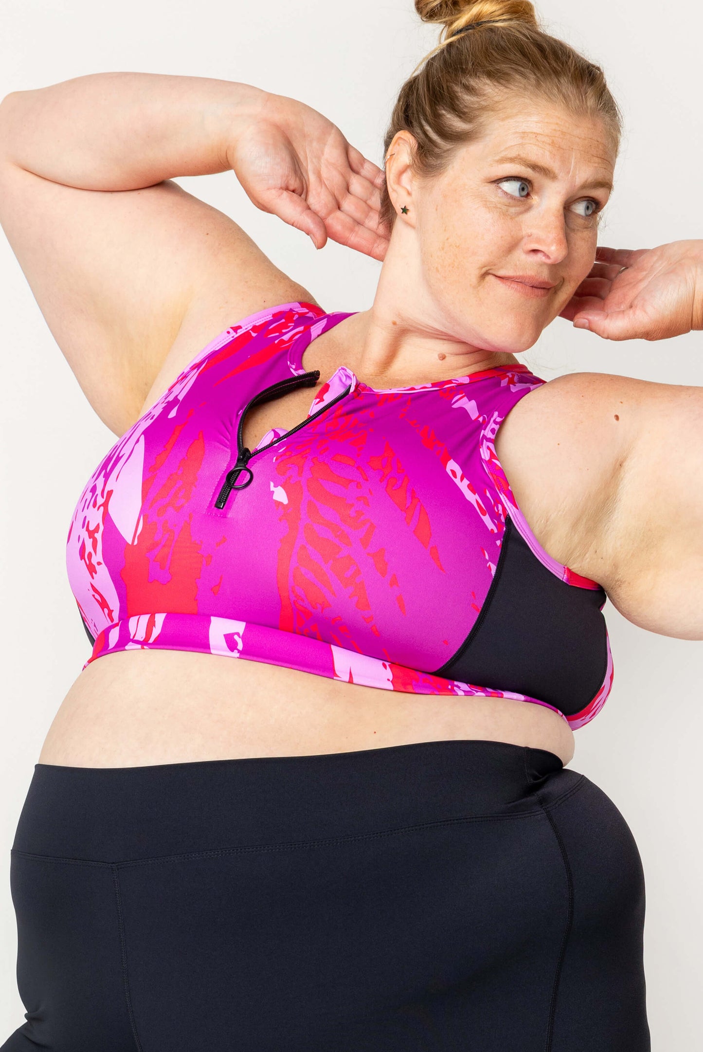 Size 3X model wearing Half Zip Crop Bikini Top - Fuchsia Sunset