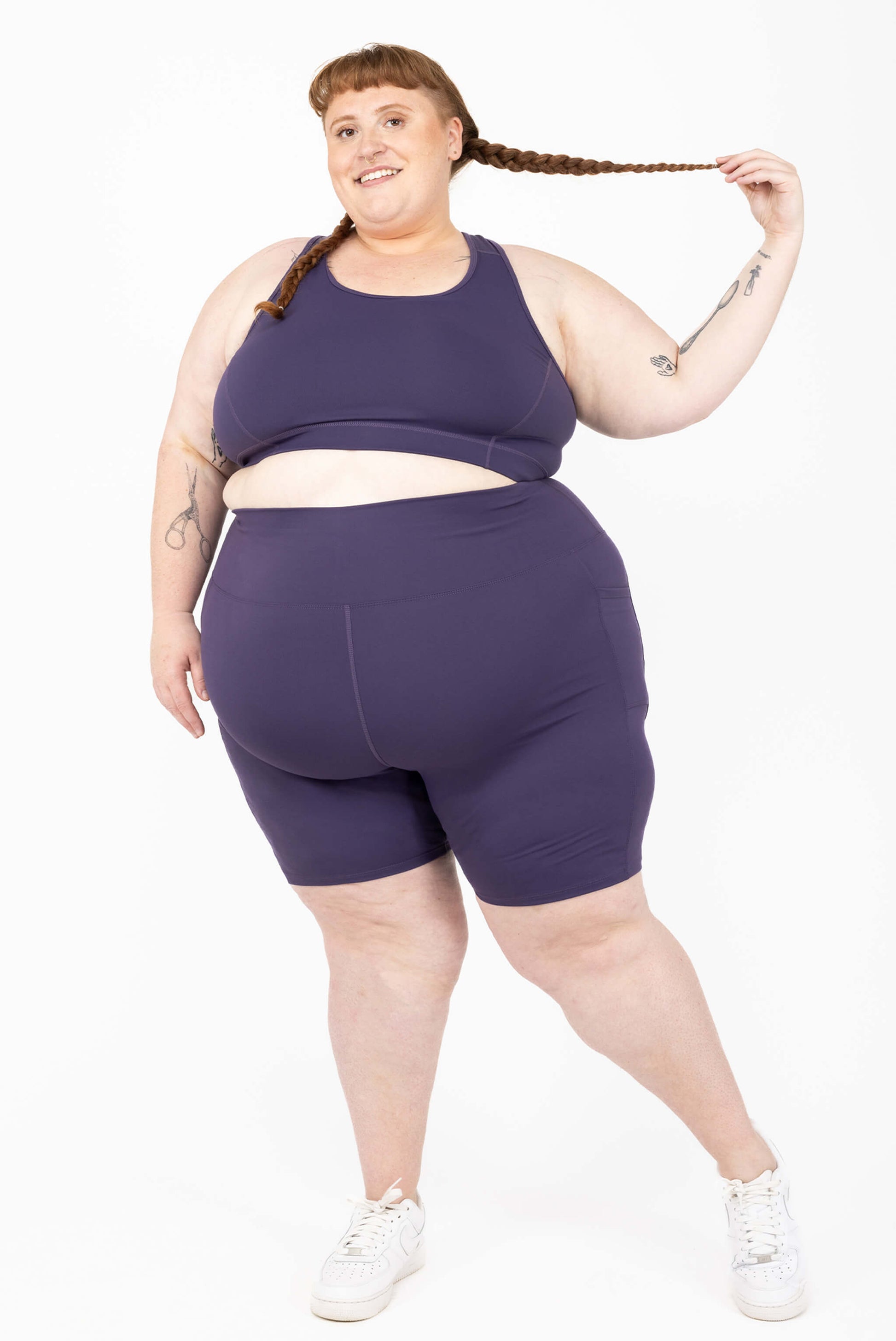 Plus size 9 inch compression biker shorts size 5X purple full body view