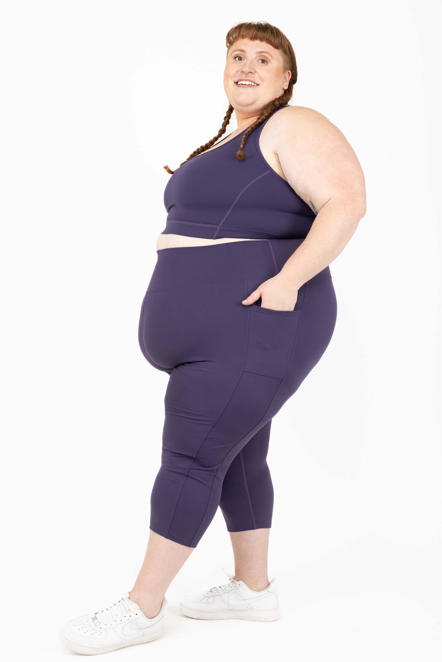 profile view of plus size compression leggings size 5X purple