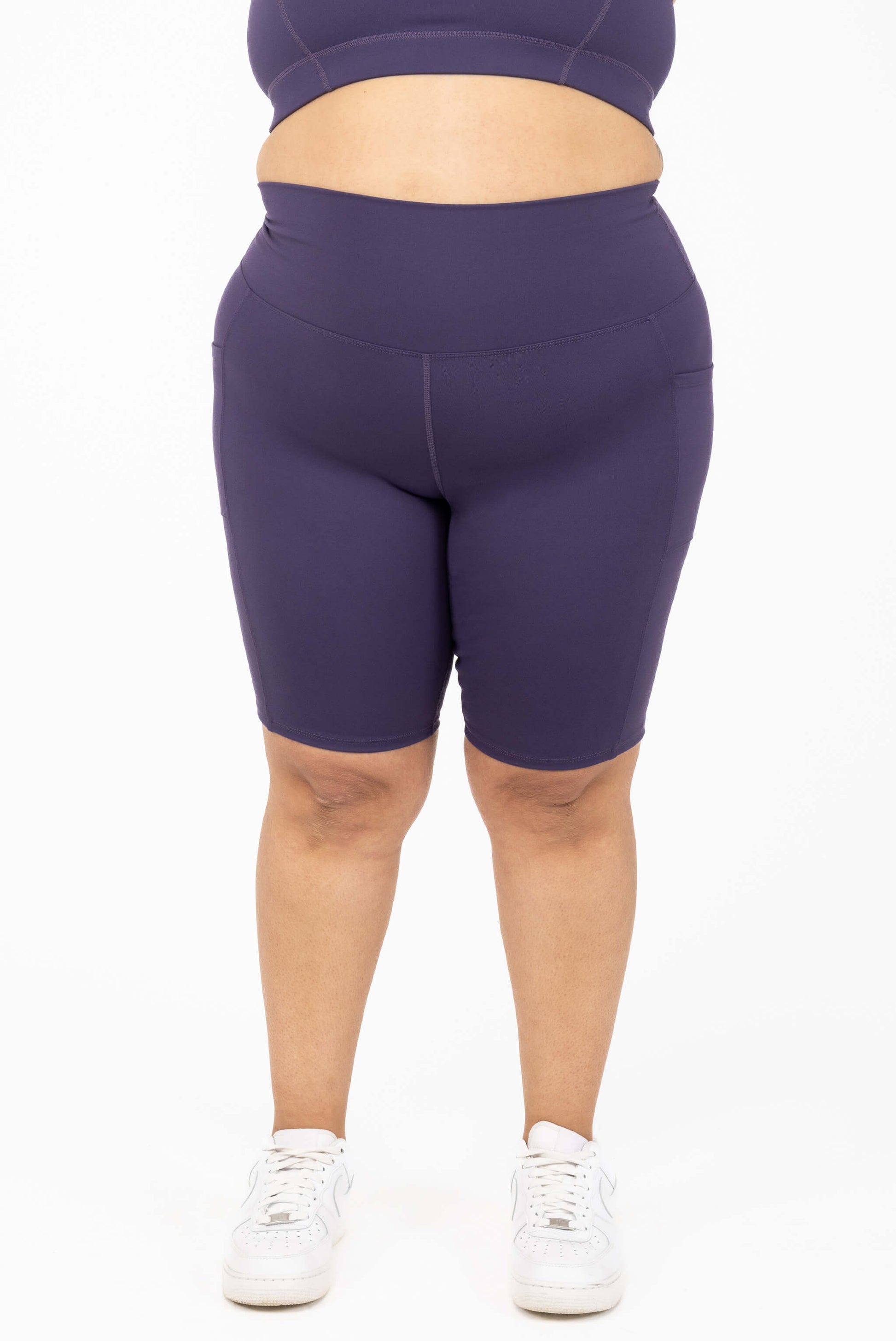 Plus size 11 inch pocket shorts deep purple closeup size 2X