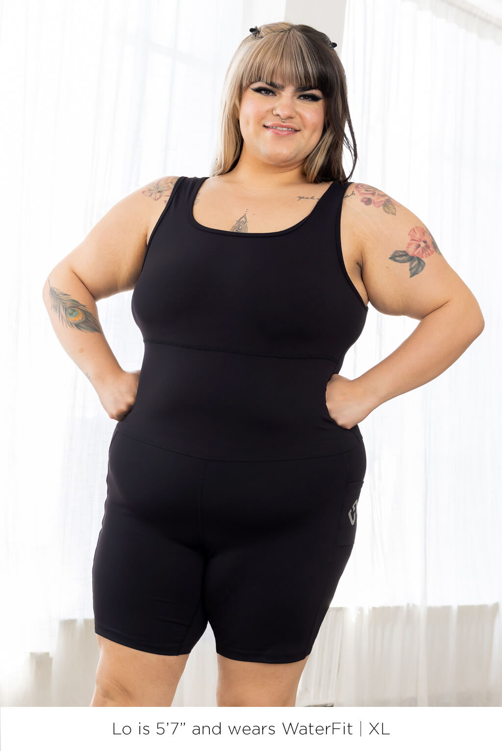 Plus size model wearing Bodysuit Black in size XL.