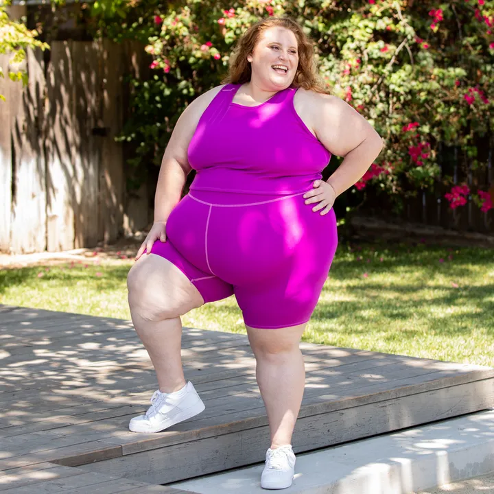 Plus size women wearing Superfit Hero Superbright collection.