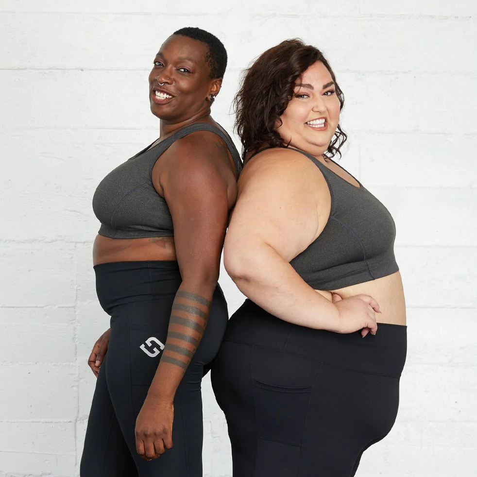 Two plus size women wearing Superfit Hero Superhold collection.