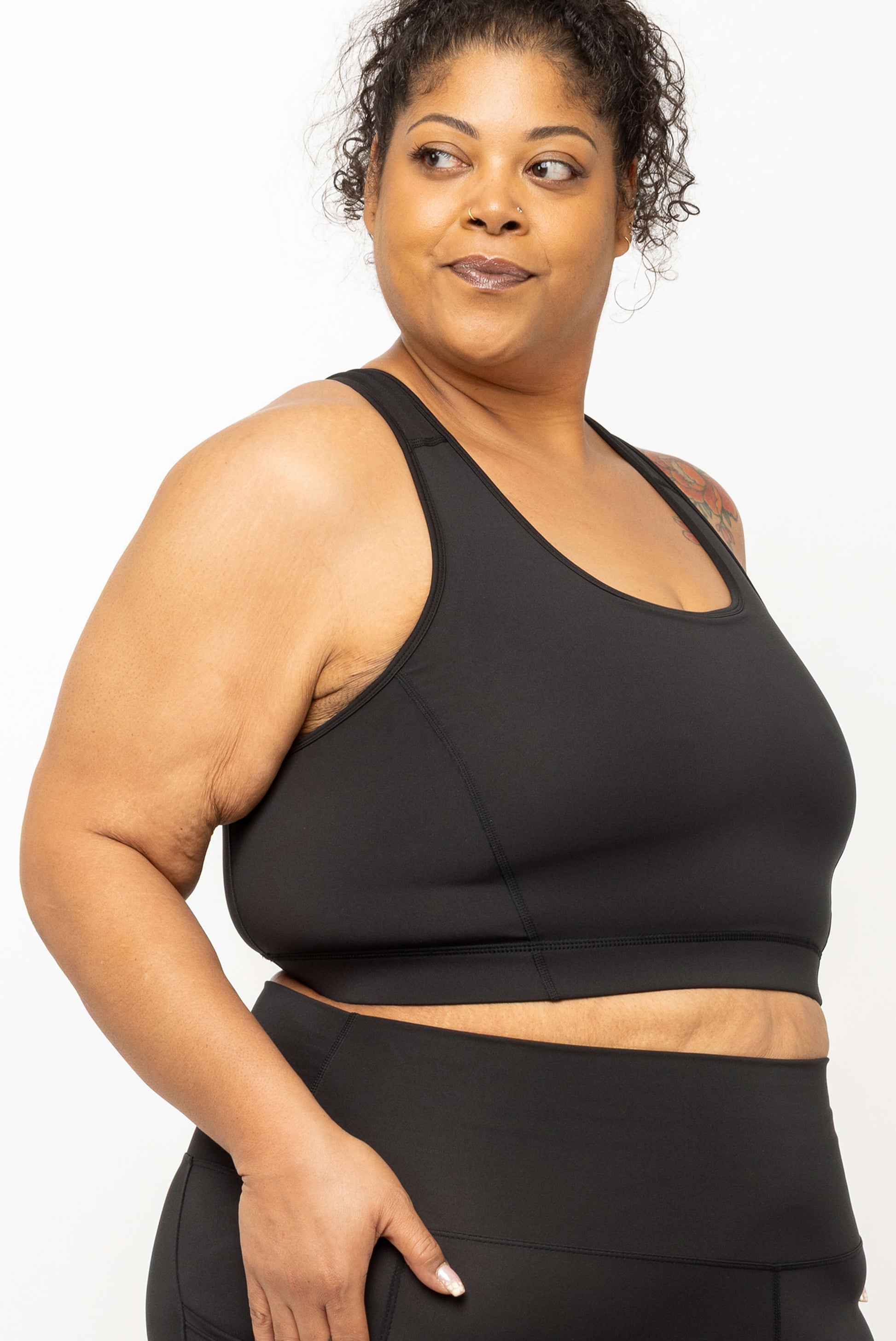 Profile view of Black SuperCool Racerback Sports Bra size 2X