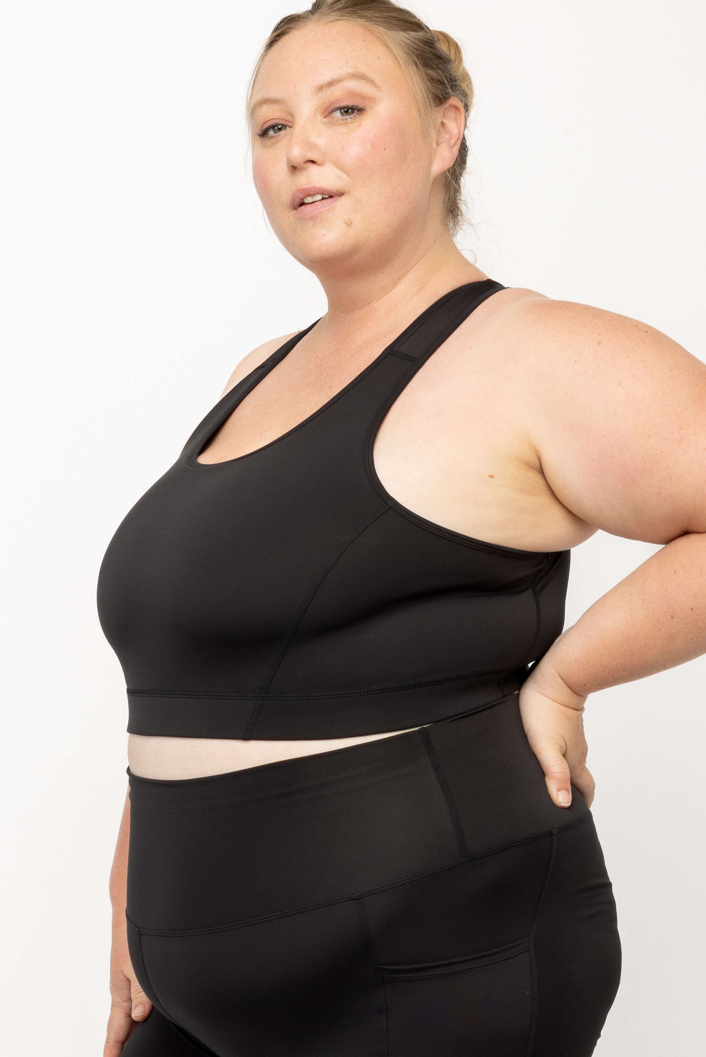 Profile view of Black SuperCool Racerback Sports Bra size 2X