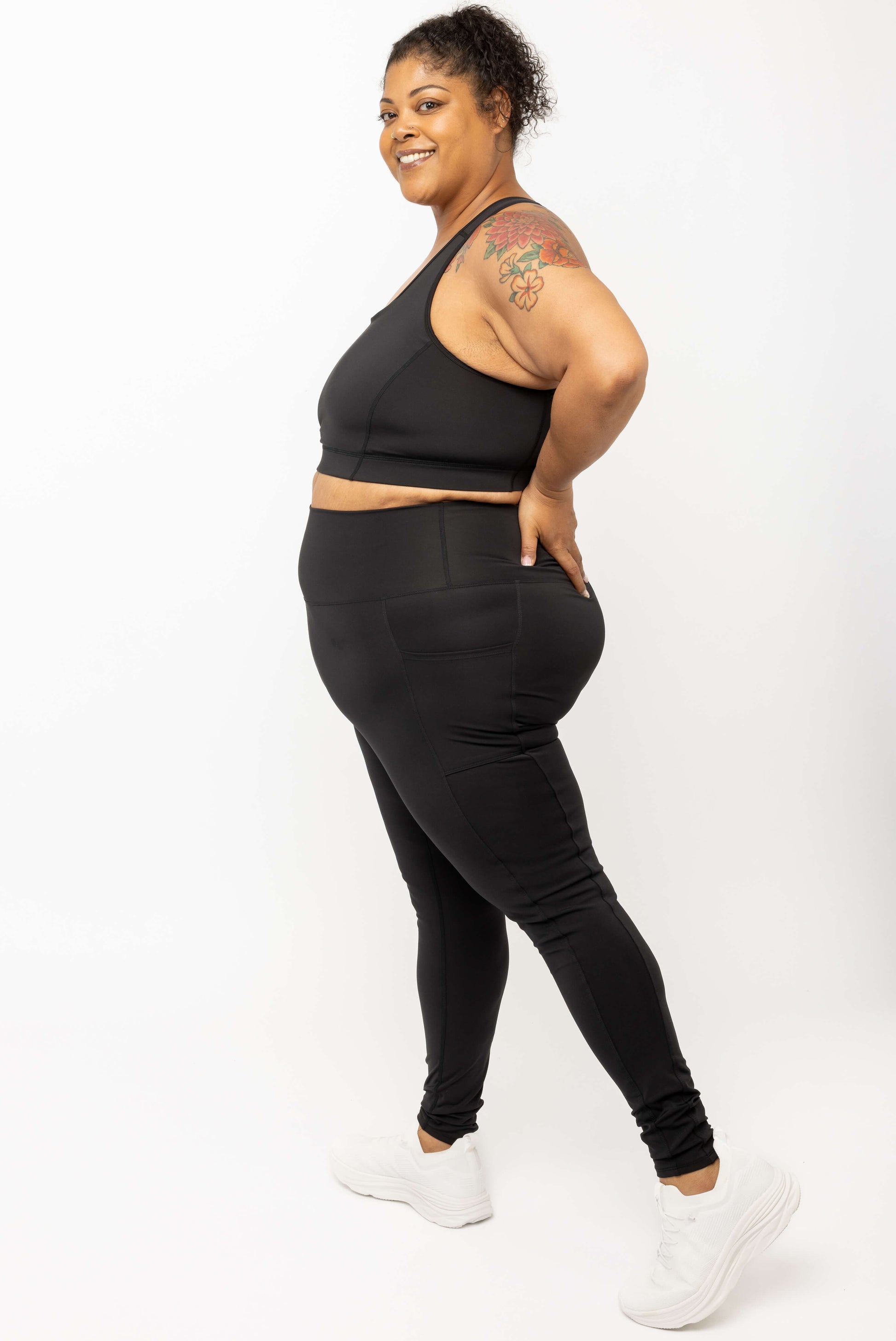Full body profile view of model wearing Black SuperCool Leggings with pocket size 2X