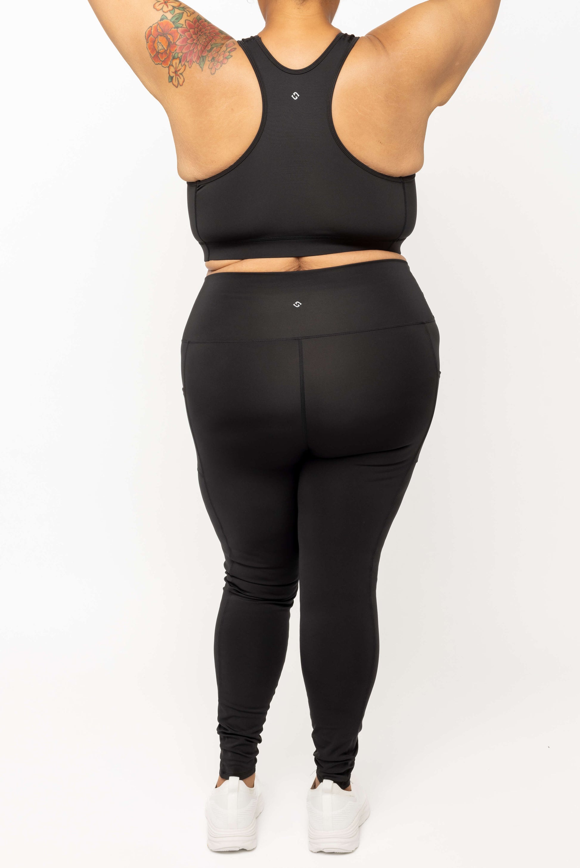 Back view of model wearing Black SuperCool Leggings with pocket size 2X