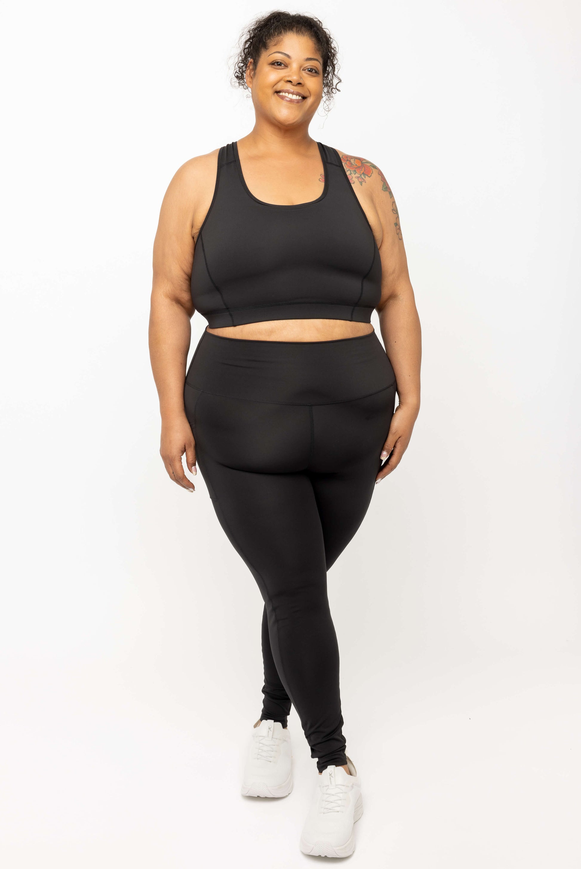 Happy model wearing Black SuperCool Leggings with pocket size 2X