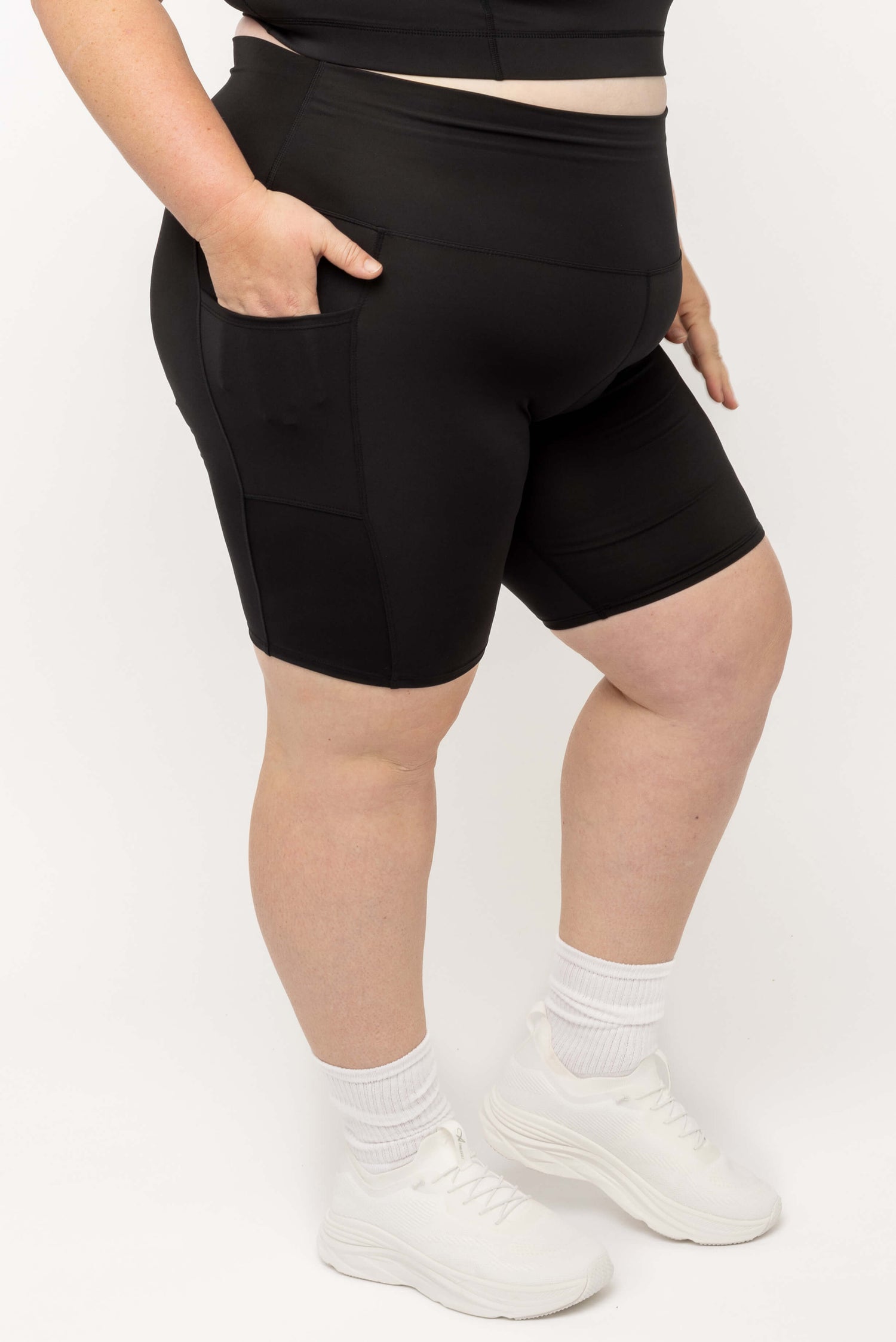 Profile view of Black SuperCool 9 inch shorts size 2X with pocket