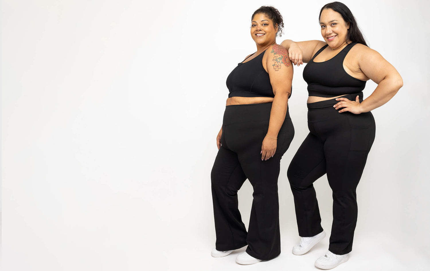 Two Plus Size Models wearing Superfit Hero compression leggings in flare and straight leg