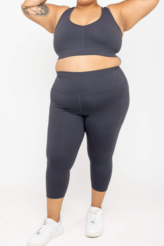 Model wearing Superfit Hero SuperHold™ Pocket Capris, color Carbon, size 2X