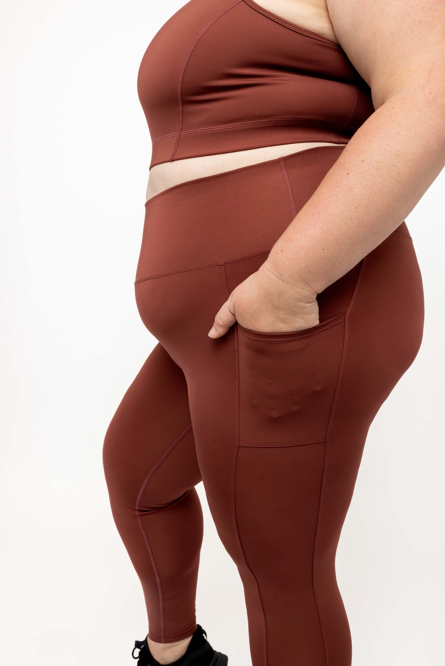 Closeup of side pocket of Cinnamon SuperCool leggings