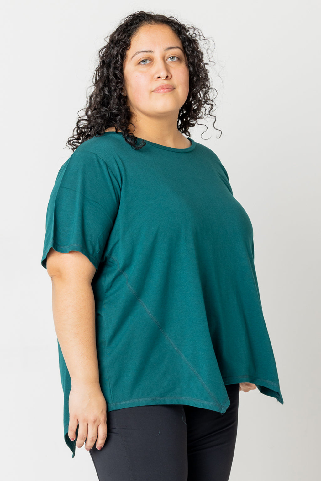 Front view of plus size flow tee in forest green, size 3X