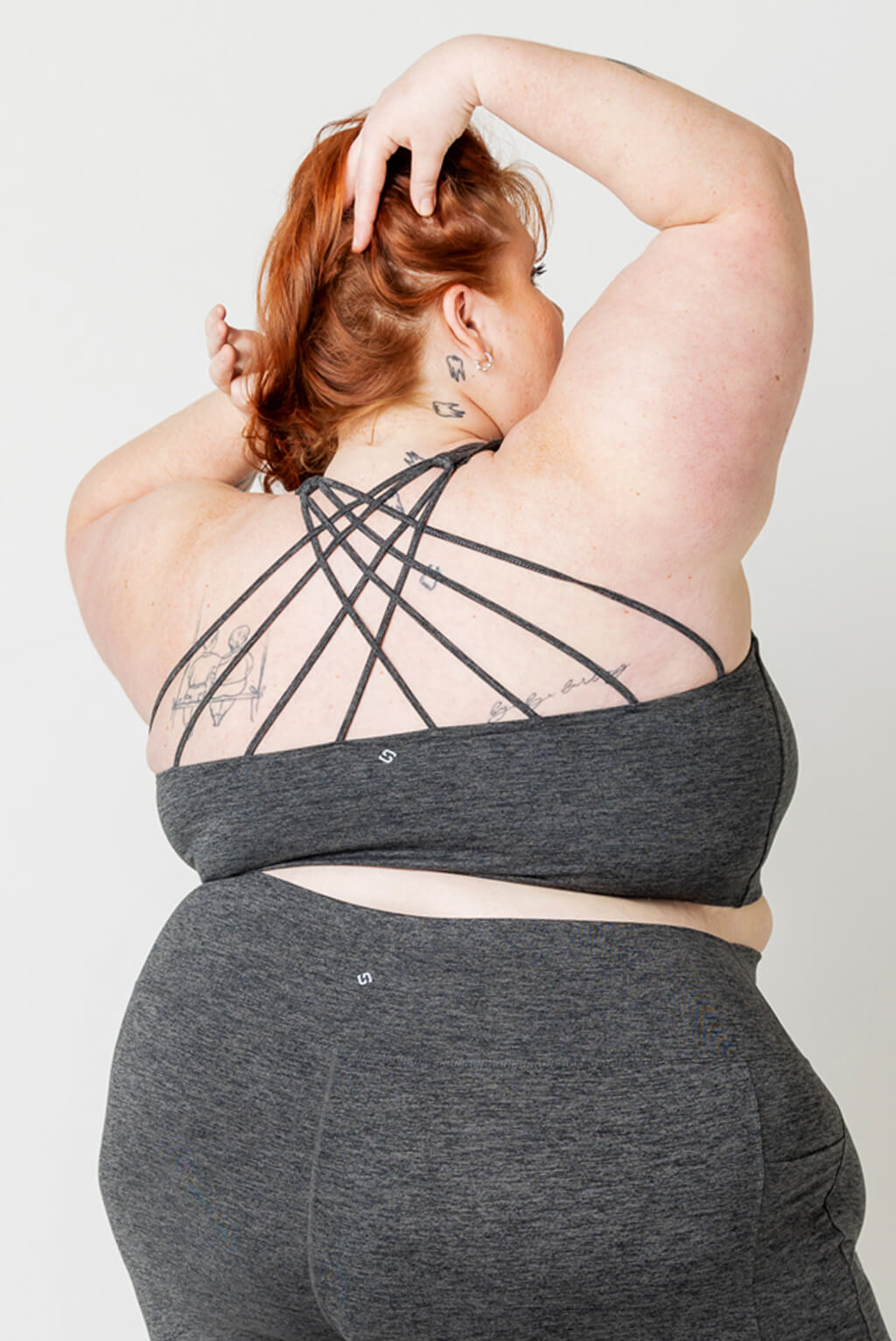Back view of Plus size model wearing Superfit Hero SuperSoft Strappy Bra in Heather Gray