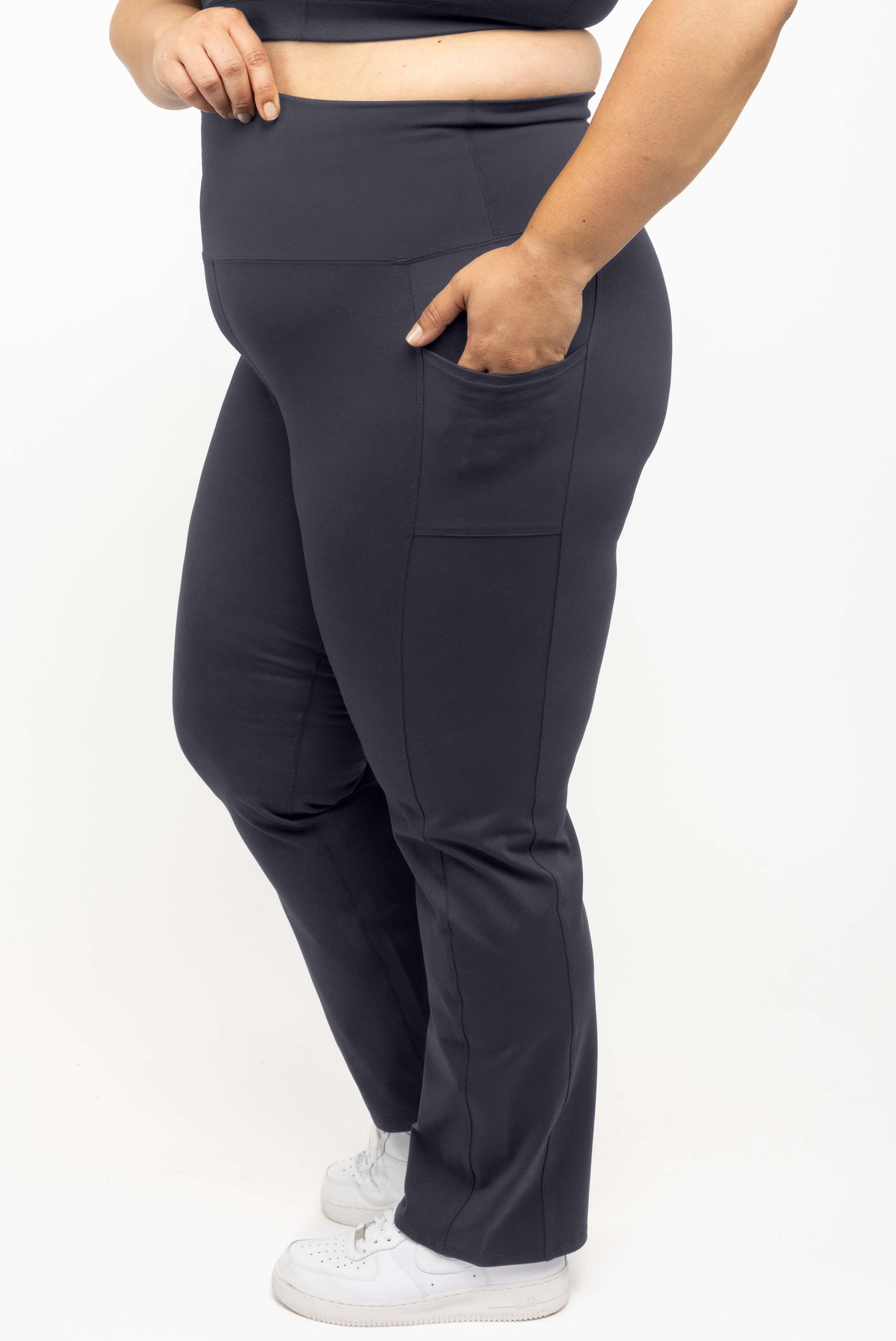 Profile view of SuperHold™ straight leggings in Carbon color, size 2X