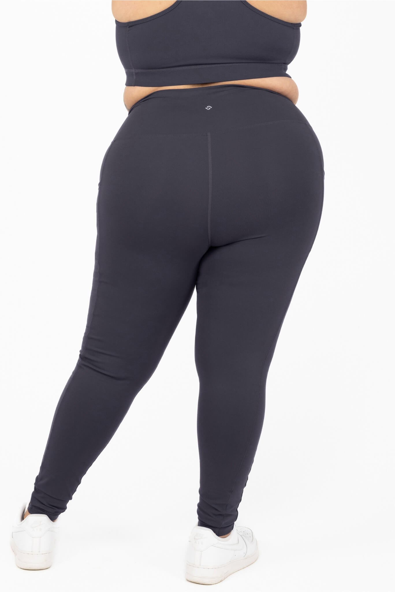Back view of Superfit Hero SuperHold™ Ankle leggings on size 2X model