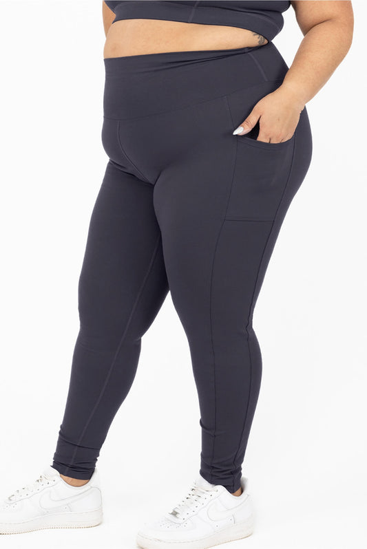 Profile view of Superfit Hero SuperHold™ Ankle leggings on size 2X model