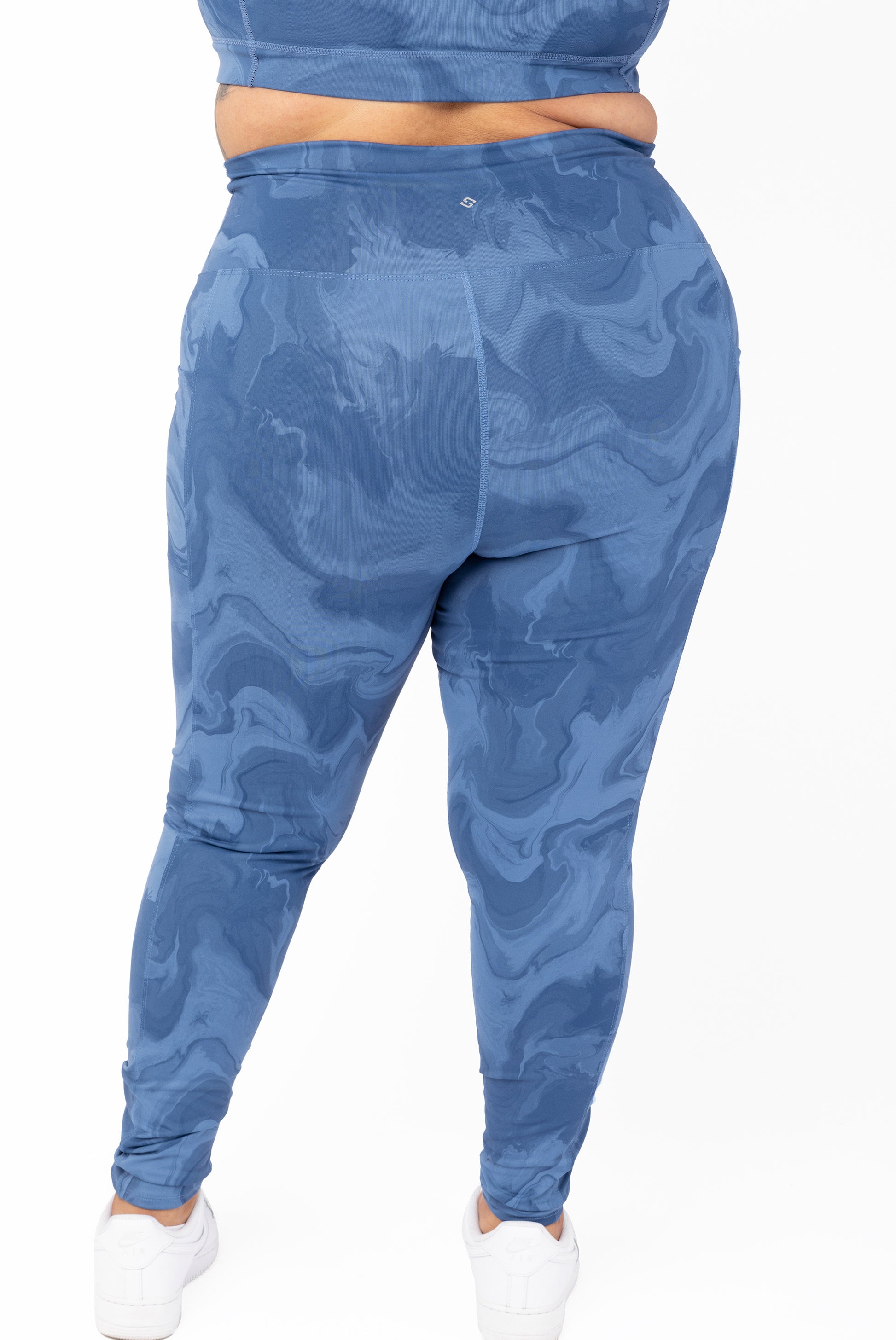 back view of SuperHold pocket leggings in moonlight marble print