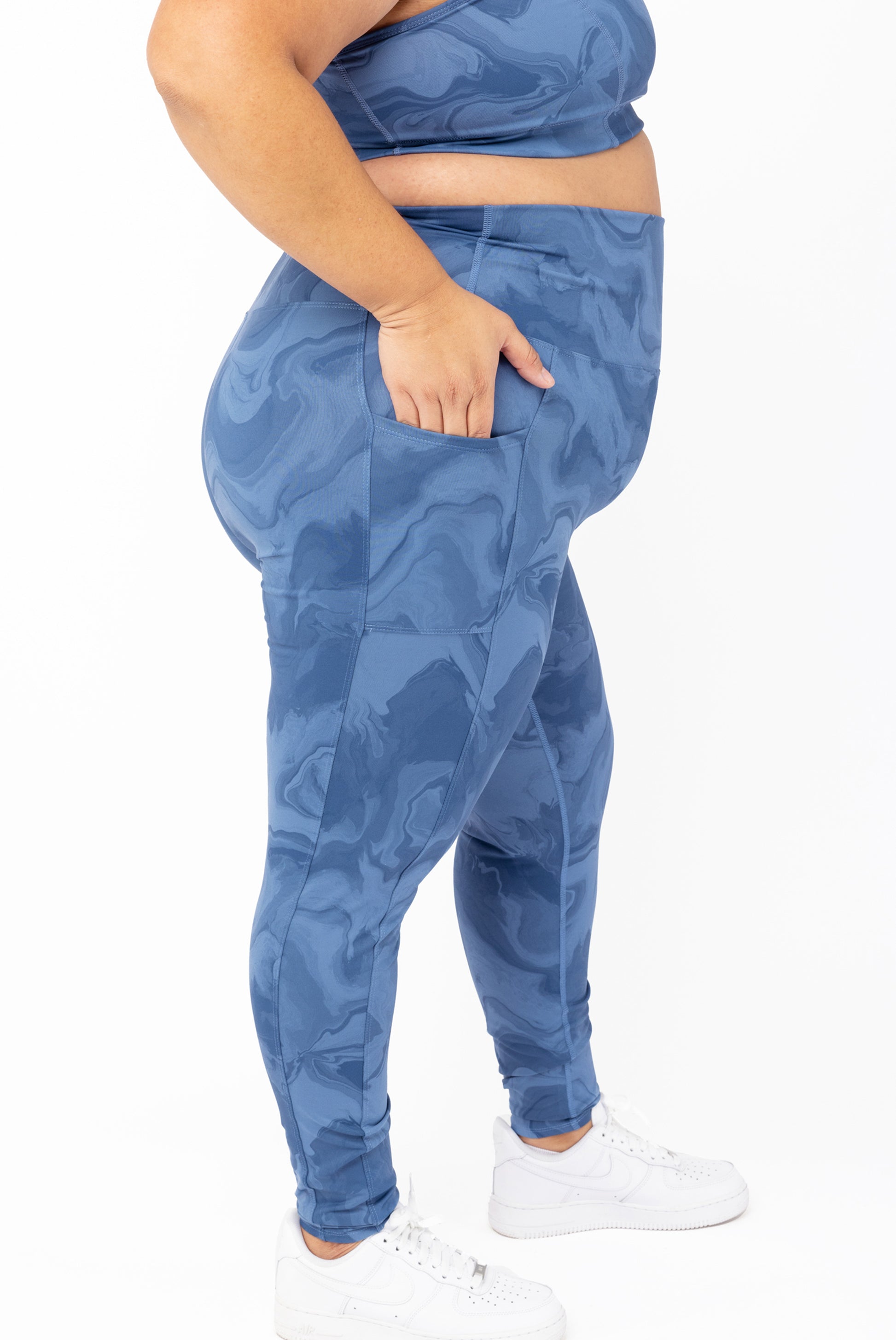profile view of SuperHold pocket leggings in moonlight marble print
