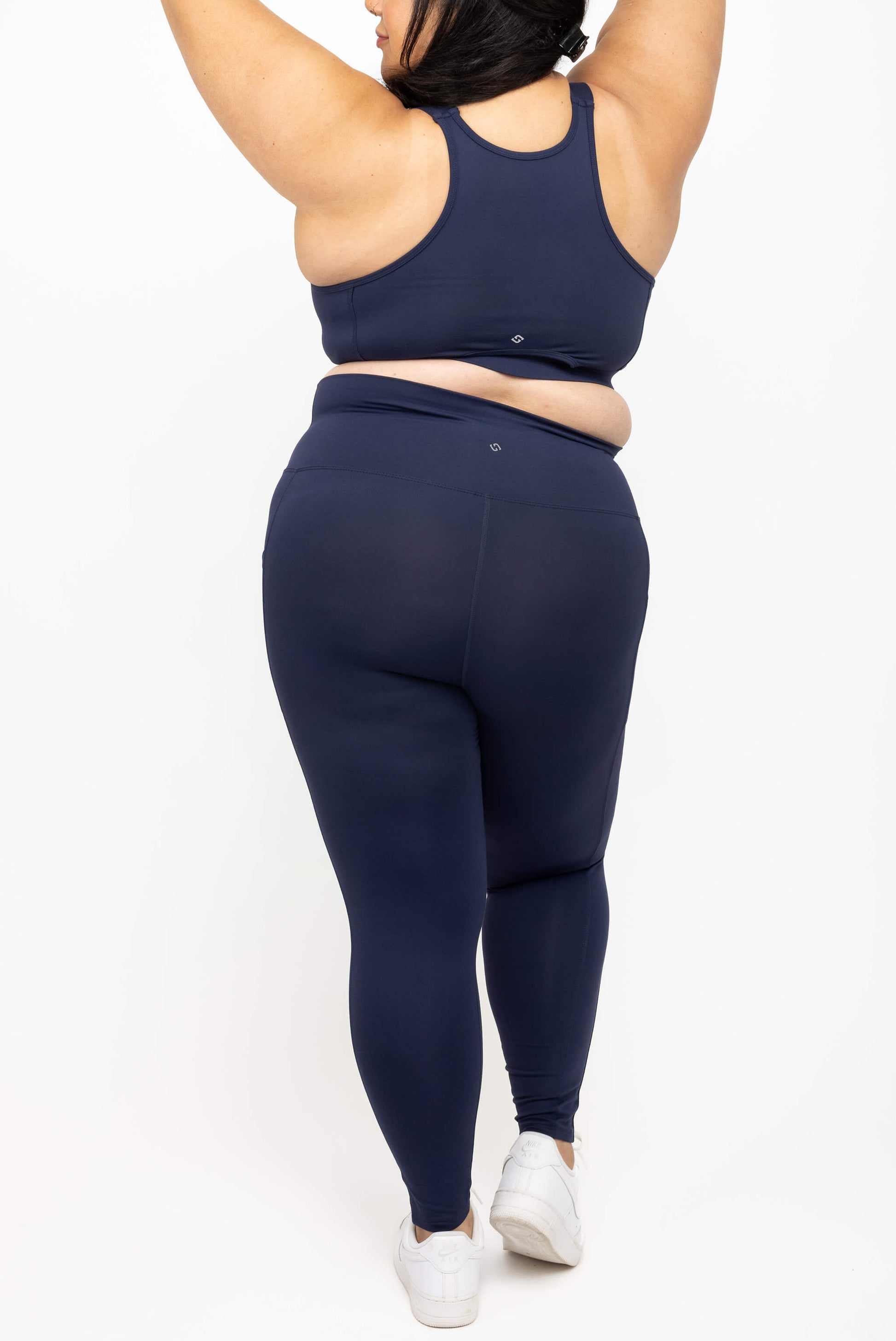 Back view of Superfit Hero navy plus size 7/8 leggings with pockets size 2X