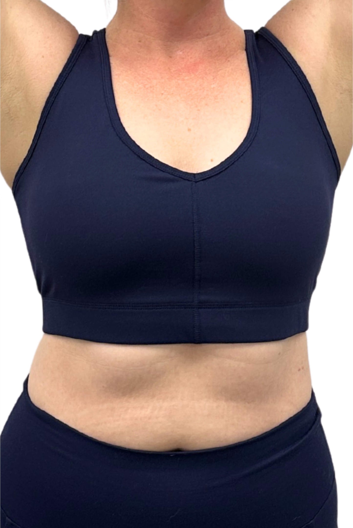 Front view with arms up of Superfit Hero V-Neck Sports bra in size Large, color Navy
