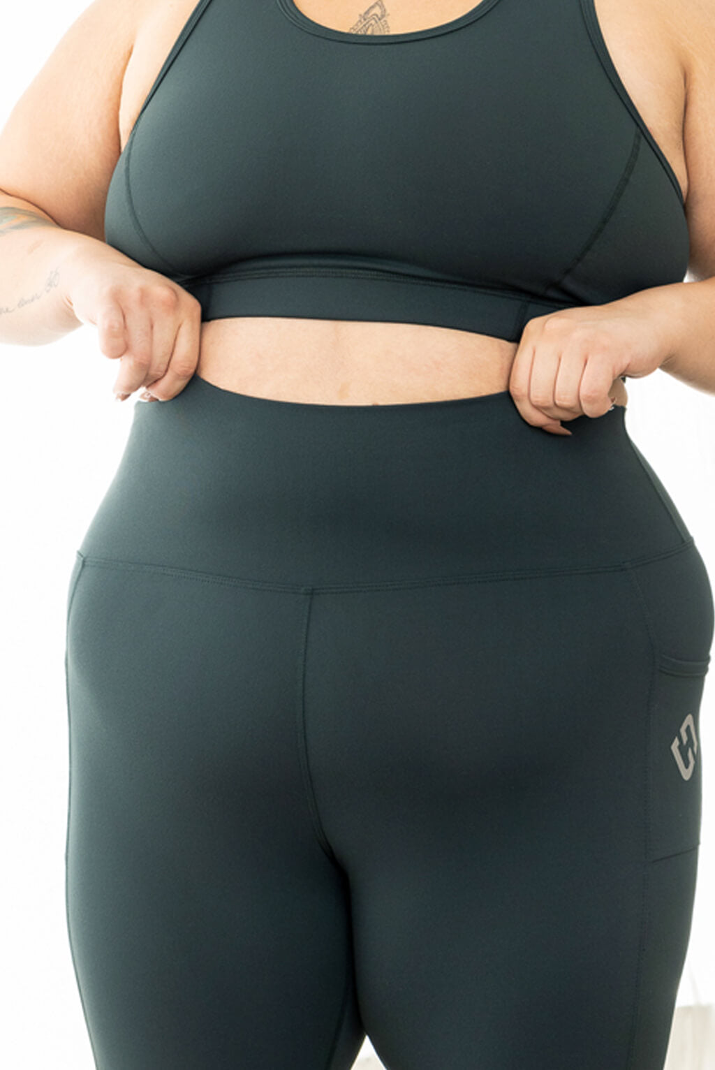 plus size capri leggings with pockets in evergreen, high compression waist band